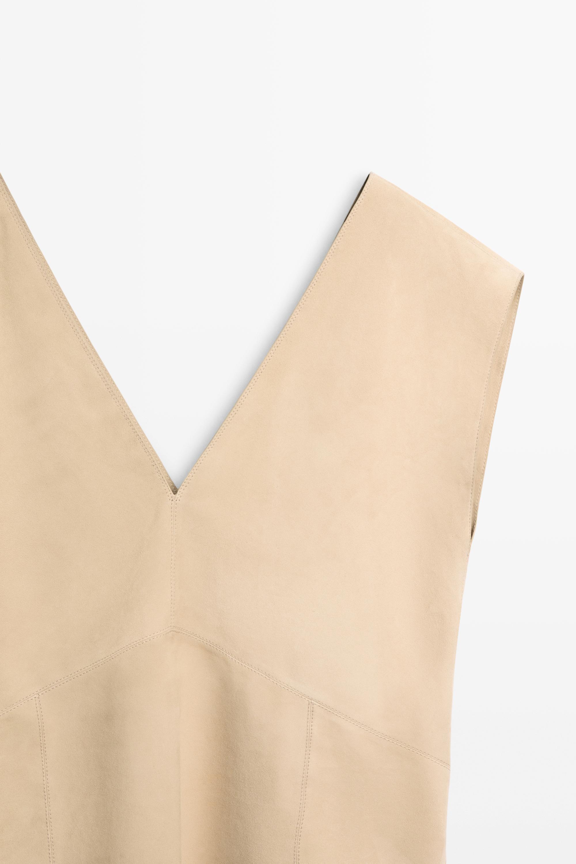 Top sans manches en cuir finition daim